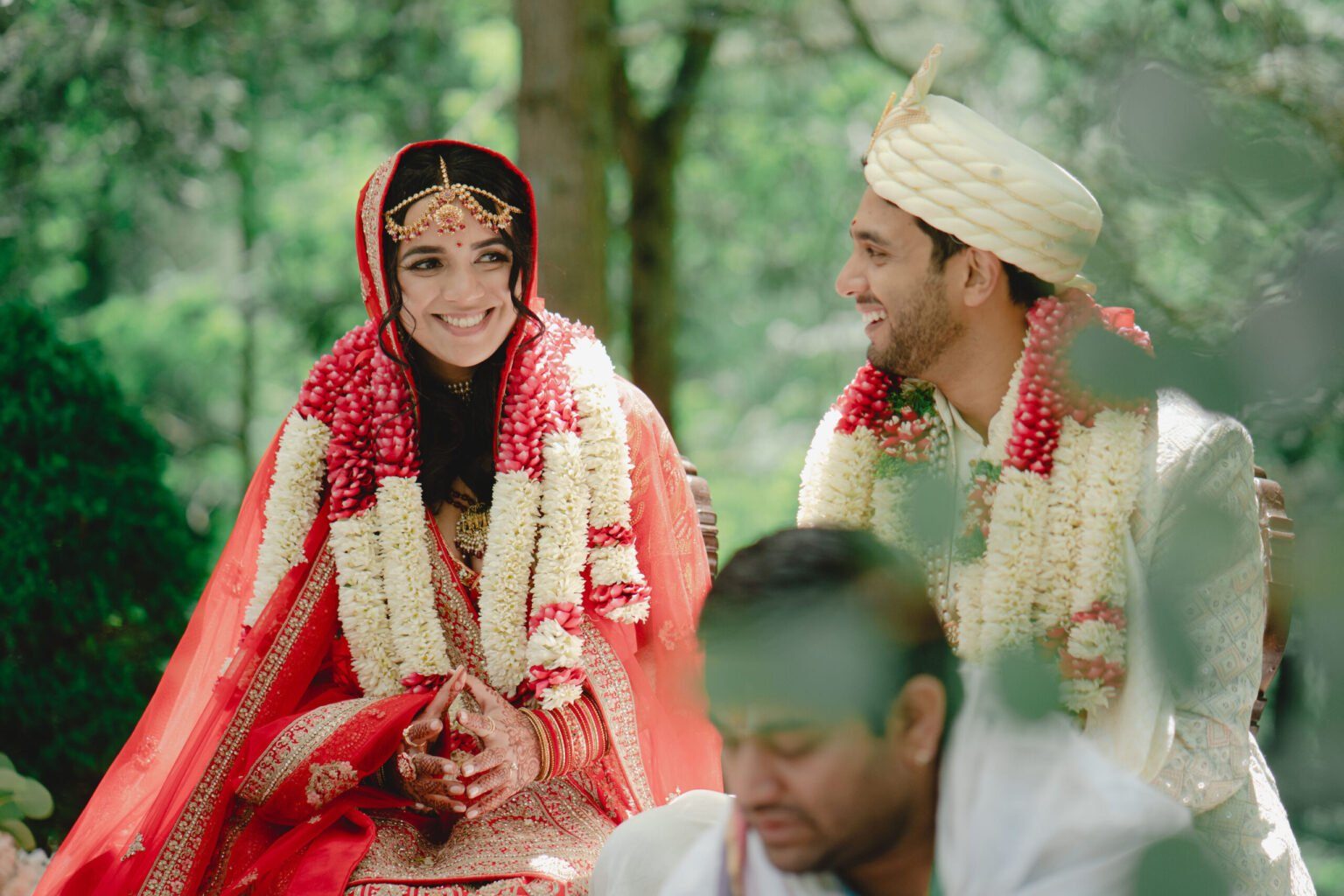 Smiling couple at their fusion wedding